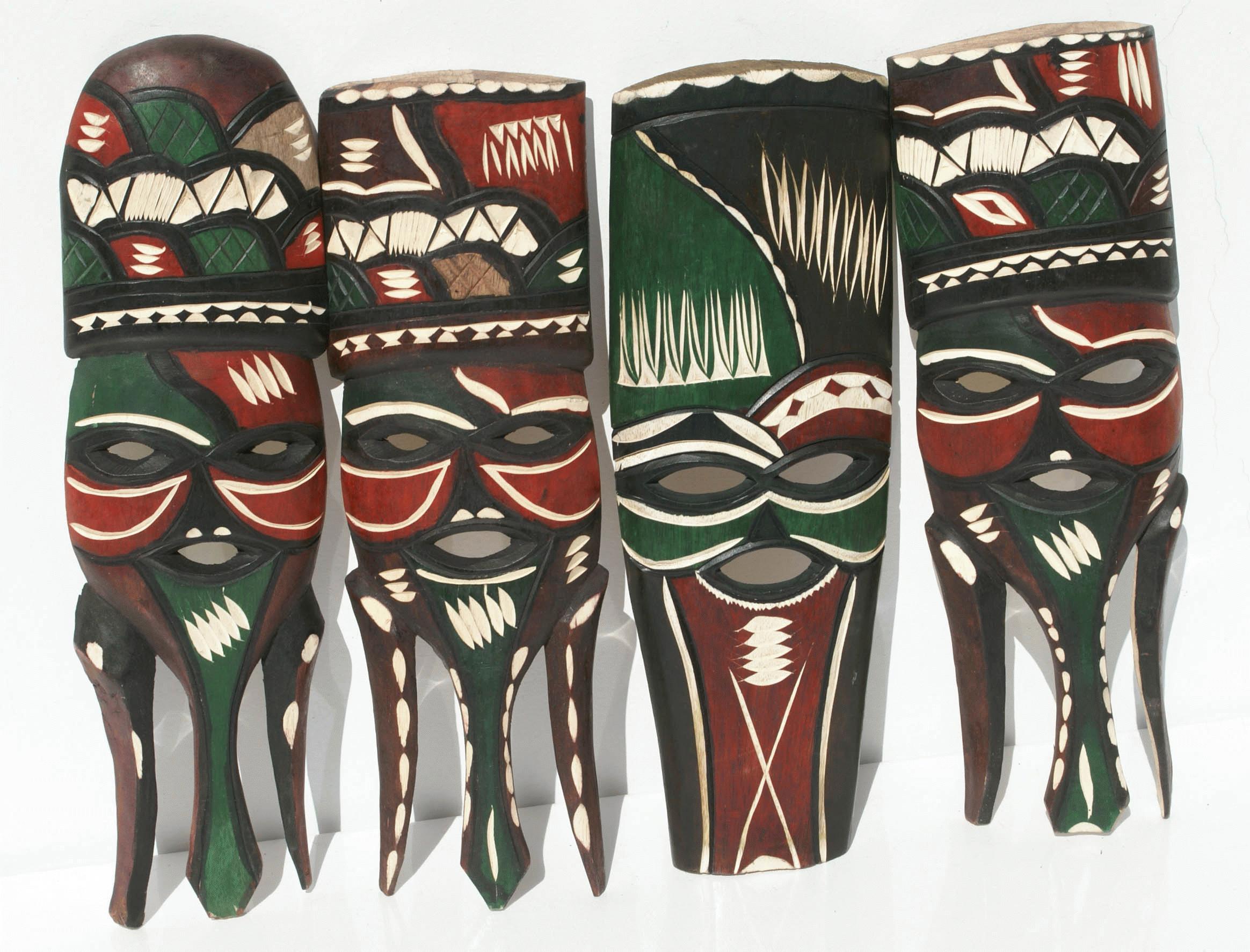 Wooden tribal masks, hand crafted in Swaziland. 
